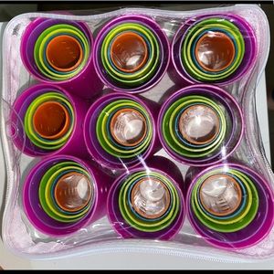 Plastic roller set. (54 pieces) NEVER USED.